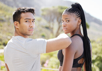 Fitness, challenge and couple ready for exercise, running and workout on a mountain together in nature. Interracial, sports portrait and healthy black woman training with personal trainer or partner