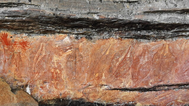 Aboriginal rock art: hands stencil-mullet, barramundi, cat fishes-Goanna lizard-long neck turtle. Ubirr-Kakadu-Australia-187