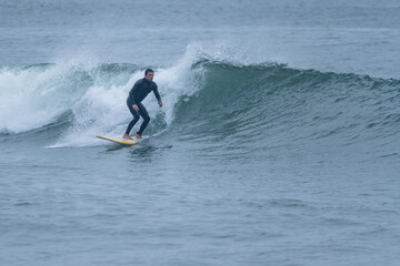 Surfer in action on the ocean waves
