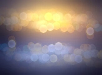 Bright shiny bokeh yellow blue blur background. Dark shadow vignette. Night glowing magical illustration for festive decor.