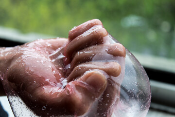 Abstract image obtained from the modeling of slime in the hand, viscous and greasy aspect.