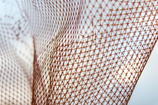 Abstract background image and texture made with plastic or mesh fabric. Close-up