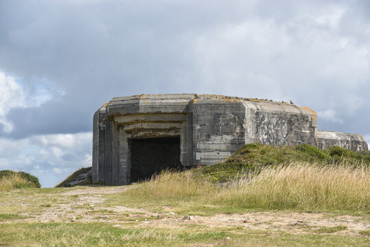 .Concrete fortification for a cannon off the coast of France, remnants of World War II.