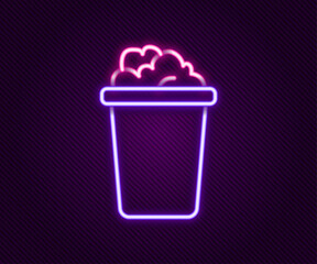 Glowing neon line Bucket with soap suds icon isolated on black background. Bowl with water. Washing clothes, cleaning equipment. Colorful outline concept. Vector