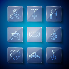 Set line Puzzle pieces toy, Toy building block bricks, Shovel, Jump rope, Bus, Gamepad, Fidget spinner and Yoyo icon. Vector