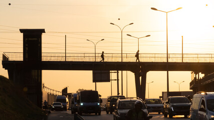 city ​​traffic at sunset, front view