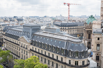 Obraz premium Galeries Lafayette Rooftop Terrace: A view over Paris from 8th floor of famous shopping centre in Paris, France