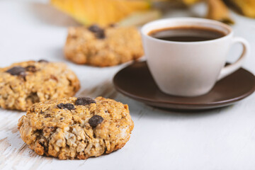 Coffee served with chocolate biscuits