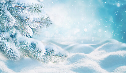 Beautiful natural winter background on New Year's theme - fir branches covered with hoarfrost against the backdrop of fluffy snowdrifts of pure snow and light snowfall.