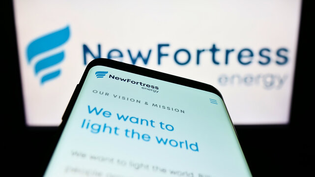 Stuttgart, Germany - 09-14-2022: Mobile phone with website of US company New Fortress Energy Inc. on screen in front of business logo. Focus on top-left of phone display.