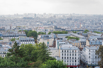 Fototapeta na wymiar Monmartre skyline Paris view. Situated in the 18th arrondissement, view from the hill where famous basilica is, one of Paris most visited monuments