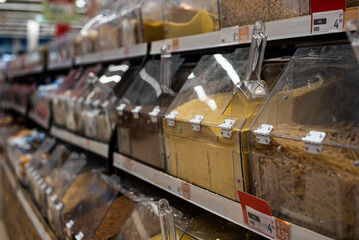 Sale of cereals in the store. Grocery.Pasta and millet, mill on the counter in the store. High-quality photography