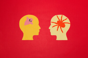 paper head is seen in one ghost in the other spider, creative Halloween concept, paper craft

