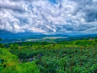 Fototapeta na wymiar landscape with clouds and sky in mountains Agriculture in the Indonesian Highlands