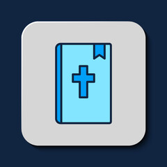 Filled outline Holy bible book icon isolated on blue background. Vector