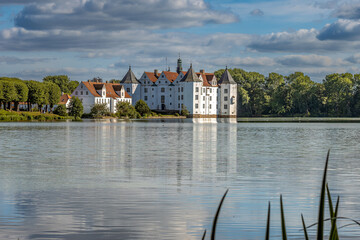 Gluecksburg Castle on the Flensburg Fjord photographed from the lake side.
