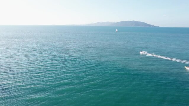 Aerial footage of hydrocyles ride the open water