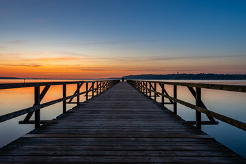 Fototapeta na wymiar Pier in Harrislee, Flensburg, Baltic Sea at sunrise