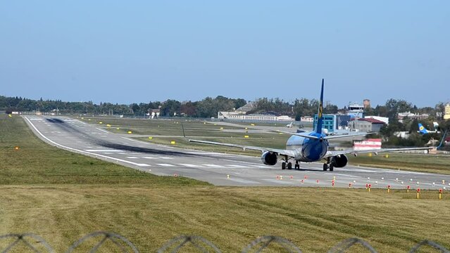 Runway at the airport. Aircraft take-off.