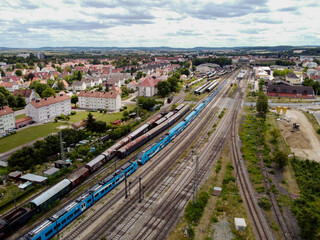 Aerial view at yard trains and railroad with wagons