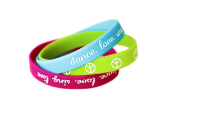 Bright bracelets with an inscription on a white background.