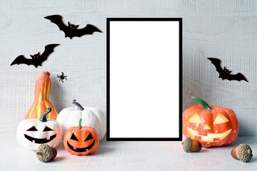Halloween decorations on pastel gray background. Halloween concept. Pumpkin, bat and spider