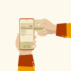 Online payments. Close-up of a human hand holding a payment or debit card and the other hand holding an NFC-enabled mobile phone to check the balance. Transactions with NFC technology.