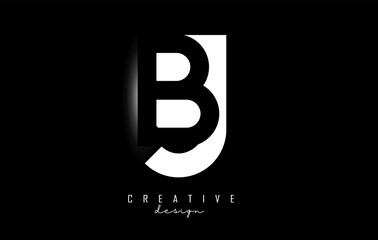 Letters BJ Logo with black and white negative space design on a black background. Letters B and J with geometric typography.