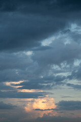 Naklejka na ściany i meble Real sunset sky with beautiful light clouds. Huge permissions.