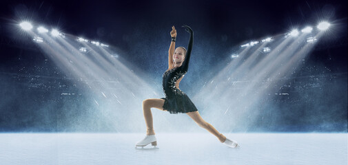 Winner. Junior female figure skater performing short program over ice arena background. Dance,...