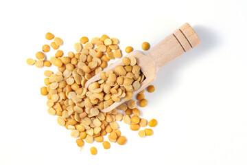 Yellow Lentils (Harhar Dal). Yellow Lentils with wooden spoon