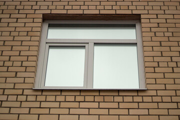 Window in building. Brick wall. Architecture details.