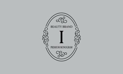 Premium monogram with the letter I. Frame with ornament. Luxury logo design with minimal modern font.