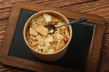 Brown paper cup of mille feuille custard cake