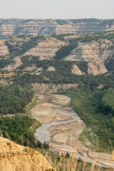 Little MIssouri River Flows Below Badlands Formations