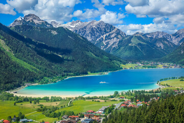 Fototapeta na wymiar Above Achensee, turquoise lake, and Pertisau from Rofan in Tyrol, Austria