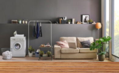 Wooden table close up and decorative grey room background style, blur detail.