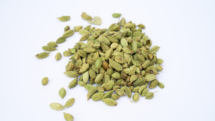 Cardamom pods and seeds isolated on white background. Green cardamom pods isolated on white...