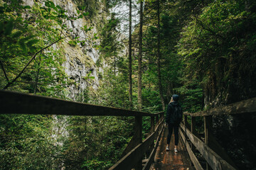 Fototapeta premium Girl on Wörschachklamm Valley walkway