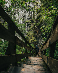 Fototapeta premium Girl on Wörschachklamm Valley stairs