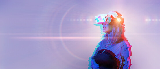 Woman is using virtual reality headset. Concept of virtual, augmented and extended reality and metaverse.