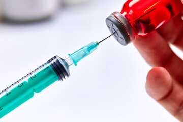  Vaccine in vial with syringe