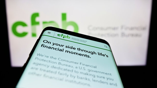 Stuttgart, Germany - 09-18-2022: Mobile Phone With Website Of US Consumer Financial Protection Bureau (CFPB) On Screen In Front Of Logo. Focus On Top-left Of Phone Display.