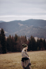 person walking in the mountains 