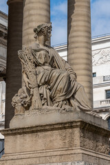 Obraz premium Paris, France - 09 16 2022: View of a sculpture outside Brongniart Palace