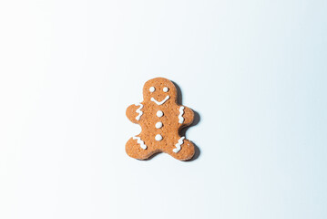 Gingerbread man.Gingerbread cookie on the white background.Top view,copy space.