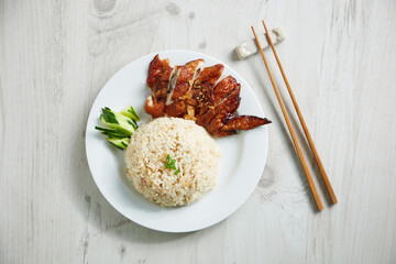 Top view of delicious Malaysia chicken rice. Asian style Hainan chicken rice close-up. Asian food.