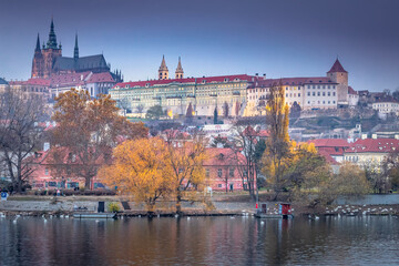 Hradcany quarter, St Vitus Cathedral and Vltava river at dusk with swans, Prague