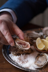 Oyster in hand