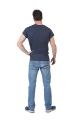 Fototapeta premium back view of a full portrait of a man on white background